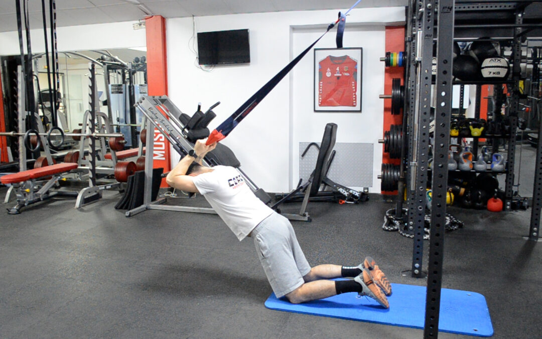 Extension Triceps à Genoux au TRX