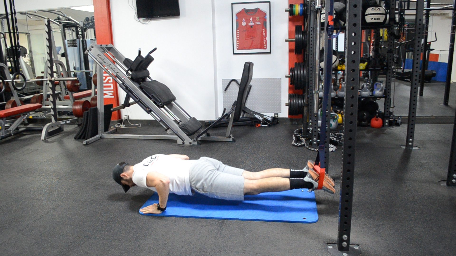 Pompes TRX (Mains au sol)